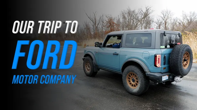 Two-door Ford Bronco on a wet lot in the SCS On The Road Our Trip to Ford episode