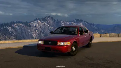 Red Ford Crown Victoria parked at a mountain viewpoint in American Truck Simulator Road Trip