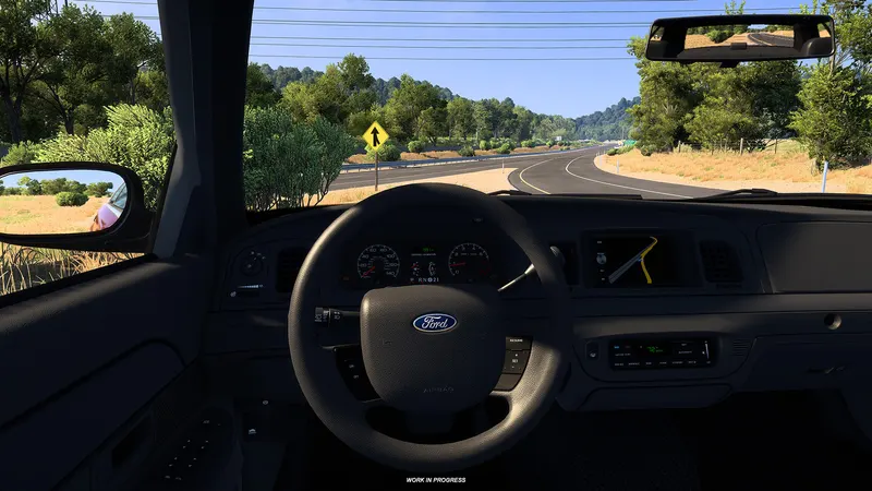 Driver's view inside the Ford Crown Victoria with the Ford steering wheel in American Truck Simulator