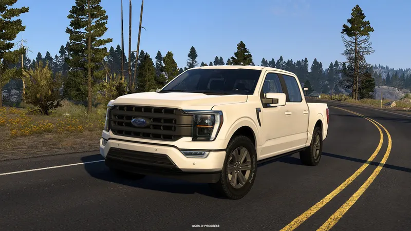 Work-in-progress white Ford F-150 Lariat on a forest road in ATS Road Trip