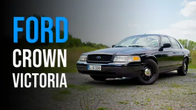 Black Ford Crown Victoria P71 Police Interceptor parked on gravel, from the SCS On The Road walk-around video