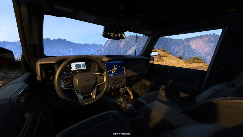 Ford Bronco Badlands dashboard and mountain view from the driver's seat in ATS Road Trip