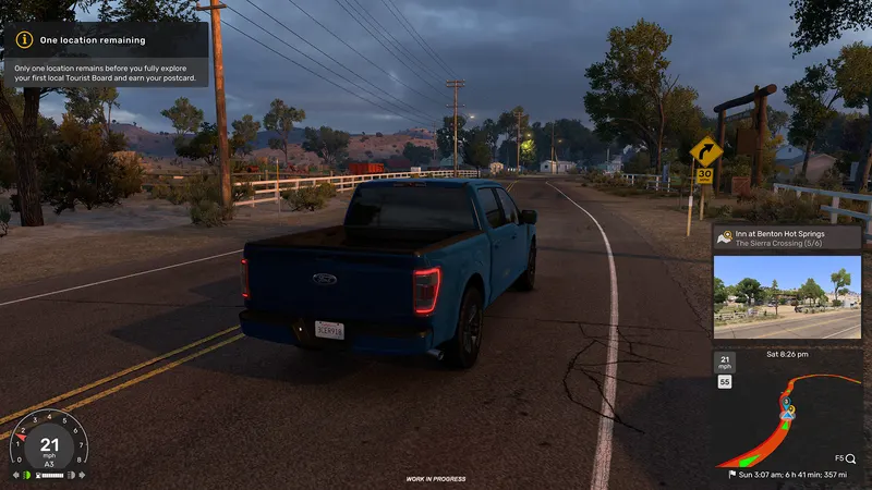 Ford F-150 at dusk with an Atlas notice that one location remains on the Tourist Board