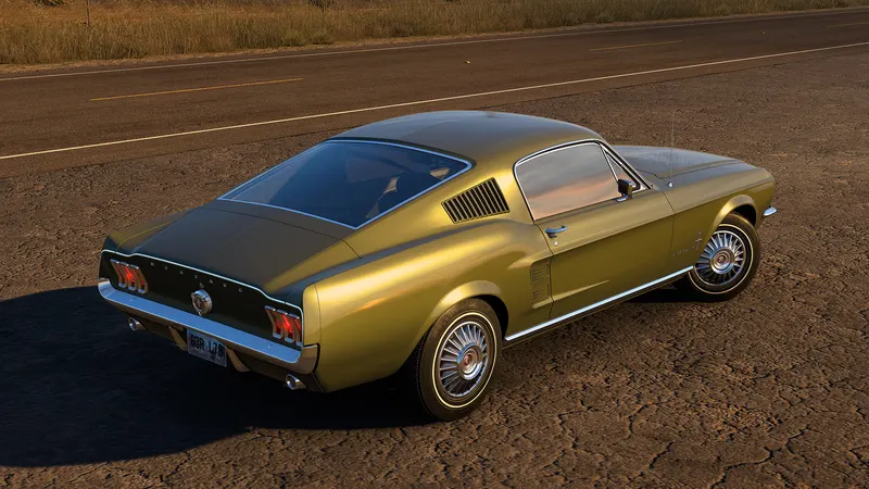 Gold 1967 Ford Mustang Fastback seen from the rear in ATS Road Trip