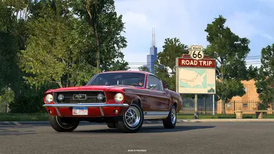 1967 Ford Mustang Fastback parked by a Route 66 Road Trip Tourist Board with the Chicago skyline behind